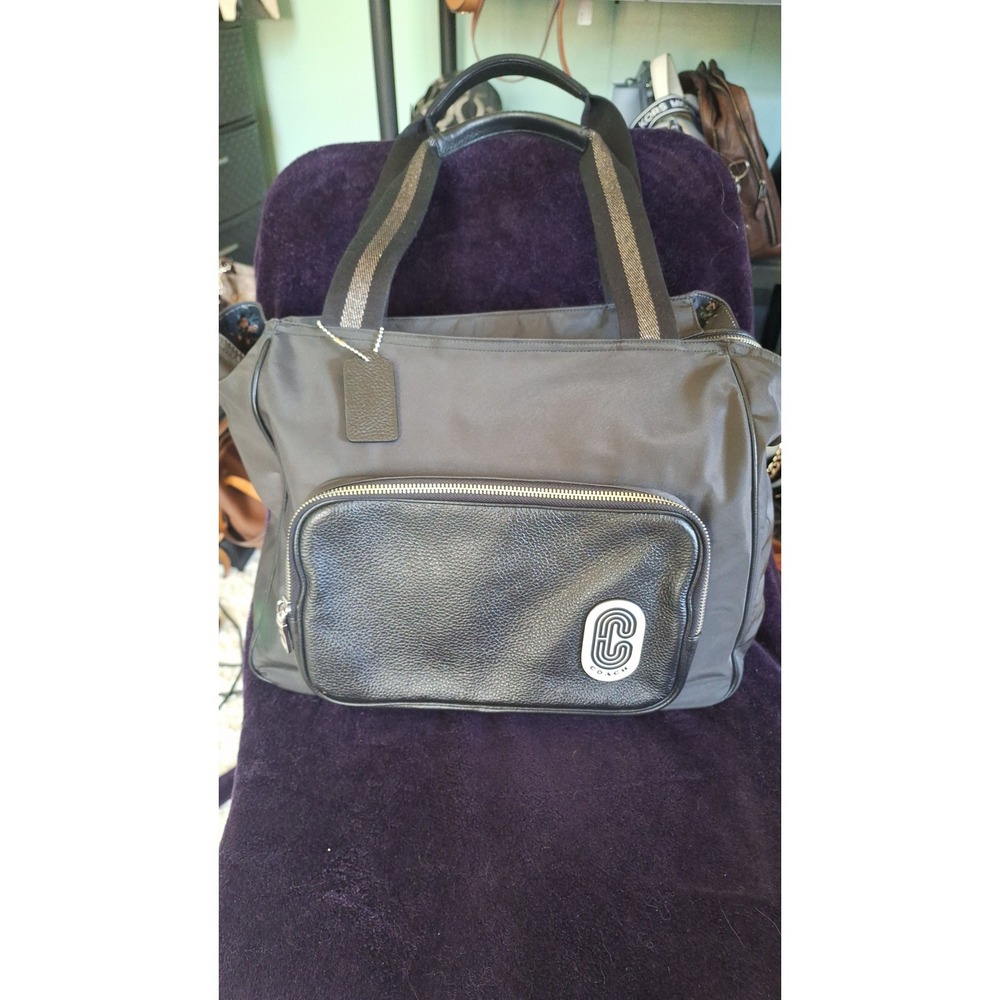 8. Coach Black Max Nylon with Leather Court Tote.